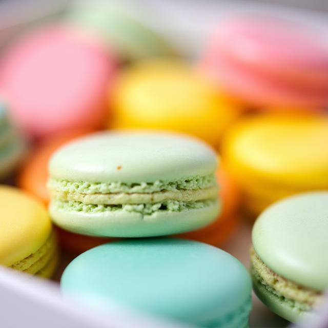 A colorful assortment of French macarons in various flavors.